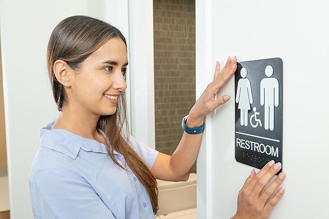 ASSURED SIGNS Unisex Bathroom Signs, Restroom Sign For Business - For Unisex Men and Women - 10 Pack - 9" by 6" - ADA Compliant with Braille and Handicap Symbol - Strong Double-Sided Adhesives Included - Apply to Door or Wall